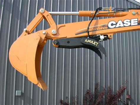 Hydraulic thumb attachment for amulet excavator